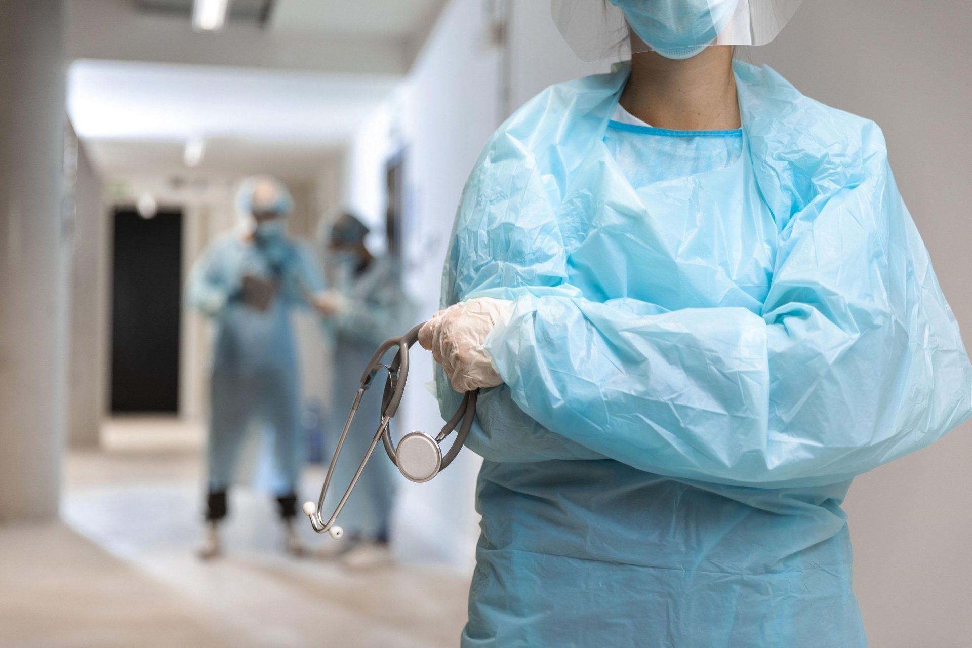 1623853982_front_view_doctor_wearing_protective_wear_in_the_hospital