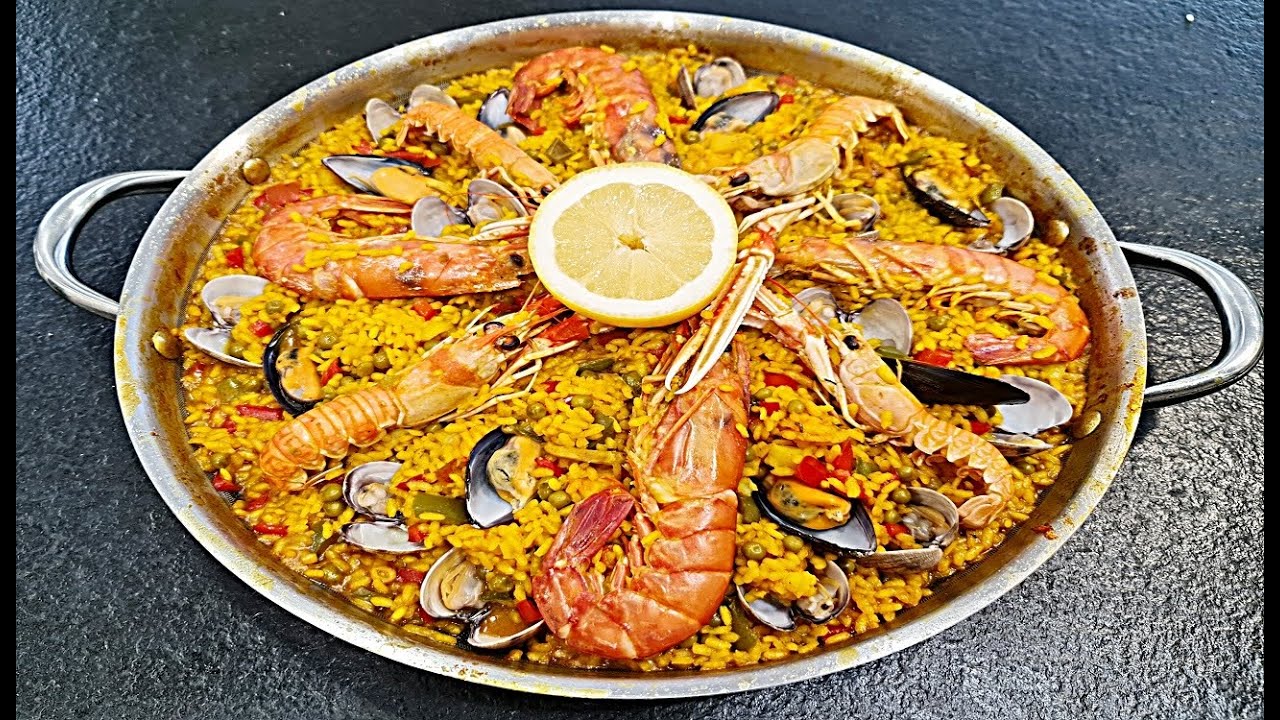 Descubre los rincones más deliciosos y auténticos: la guía definitiva para saborear la mejor paella en España 1 Moncloa ORÍGENES Y VARIACIONES: UN PLATO CON HISTORIA