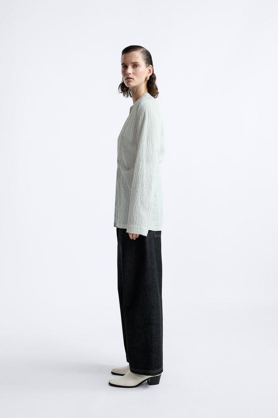 Zara tiene las 10 blusas más románticas: Son ideales para llevar con todo tipo de pantalones básicos 10 Moncloa Blusa pliegue Moncloa