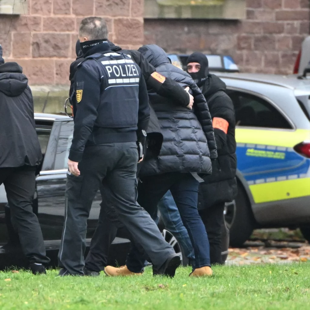 EuropaPress 4856428 07 december 2022 georgia karlsruhe police officers take suspect 2nd out of Moncloa