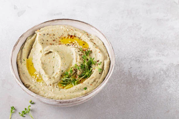 Olvida todo lo que sabes: Ryan Gosling revela su receta para un hummus de garbanzos increíblemente cremoso