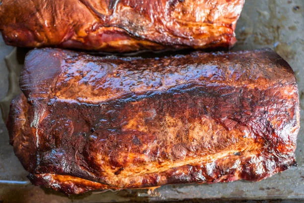 El secreto para unas costillas de cerdo que se deshagan, queden jugosas por dentro y crujientes por fuera 1 Moncloa Cocción de las costillas de cerdo