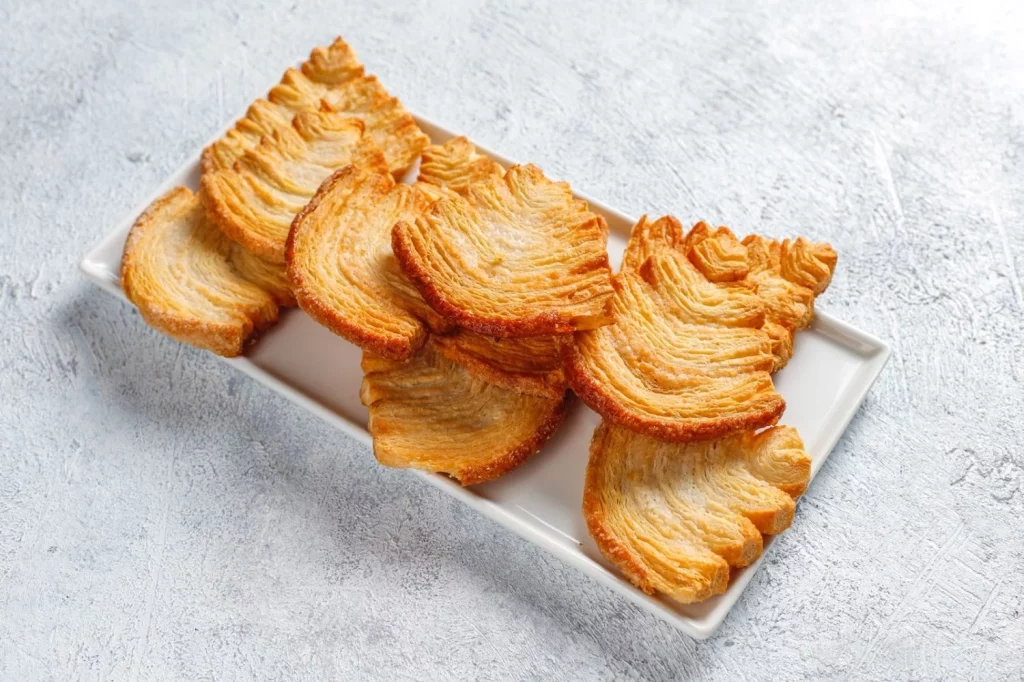 Aprende a preparar las palmeras de hojaldre que saben mejor que las de la panadería 18 Moncloa Ingredientes para unas irresistibles palmeras de hojaldre