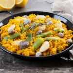 Todo lo que no sea esto no es paella valenciana: la receta canónica y sus 10 ingredientes